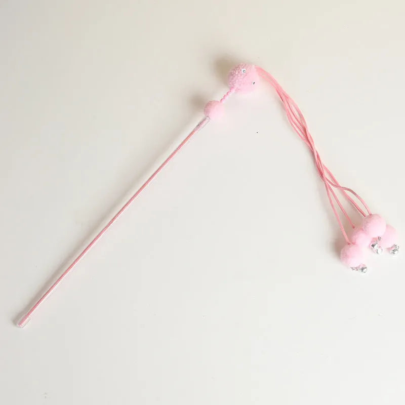 Blue cat toy wand with a fluffy tassel on a stick for interactive pet play.