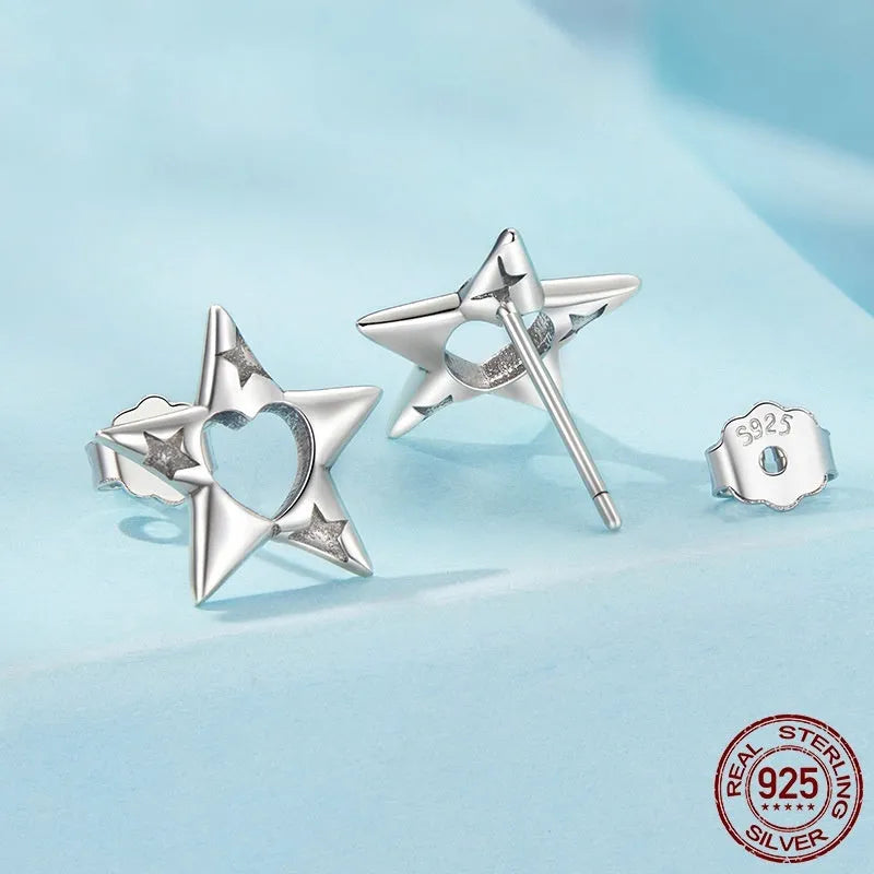 S925 sterling silver hollow pentagram star stud earrings, polished finish, SCE1886 colour, on white background