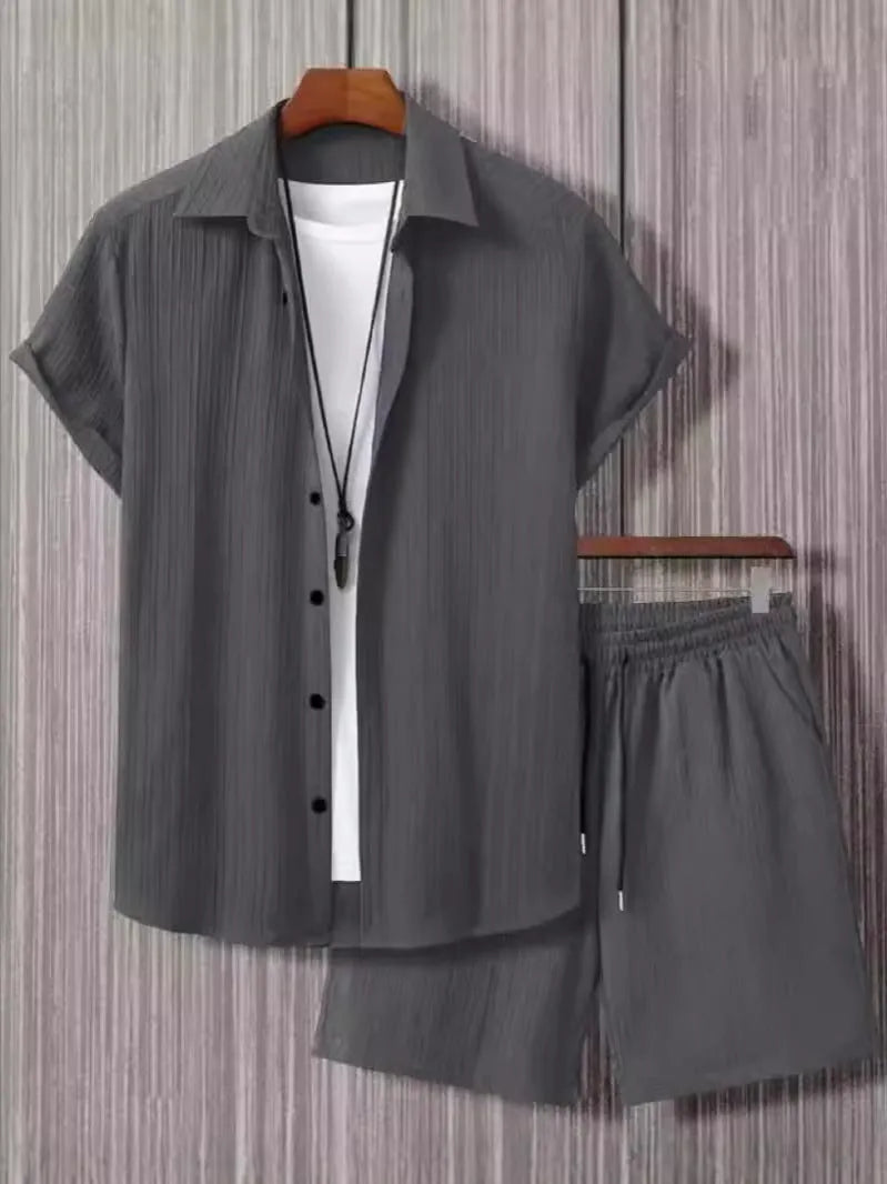Jacquard short sleeve suit set in chemical fibre blend fabric showing top and matching trousers
