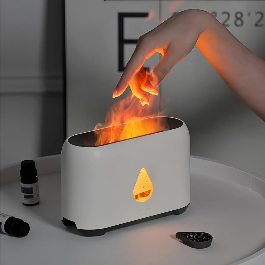 Mini remote control flame diffuser humidifier in white round plastic with single fog outlet and USB cable