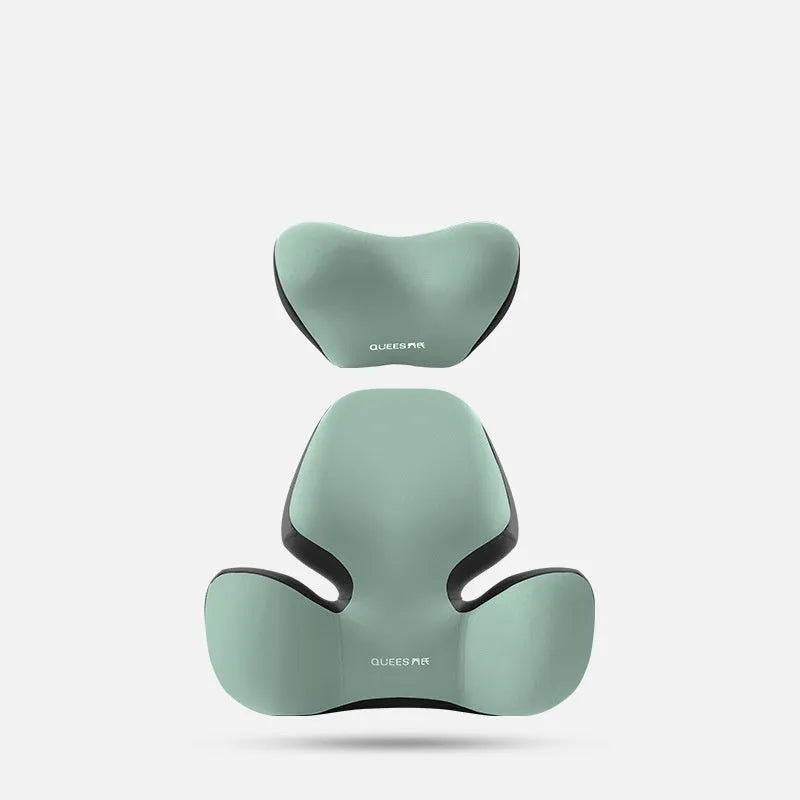 Black and grey memory foam car seat lumbar support pillow and headrest on a car seat.