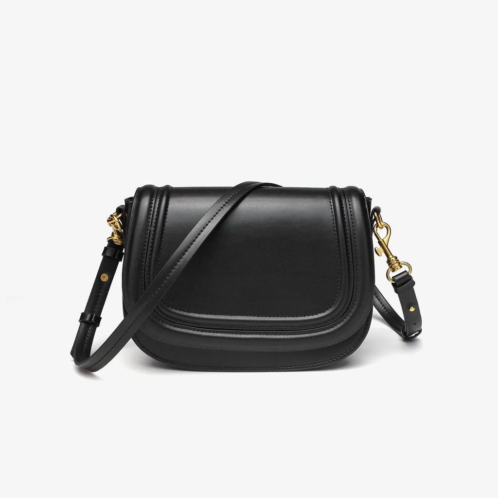 New women's crossbody bag with wide shoulder strap in PU leather, round flap shape, available in black