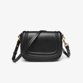 New women's crossbody bag with wide shoulder strap in PU leather, round flap shape, available in black