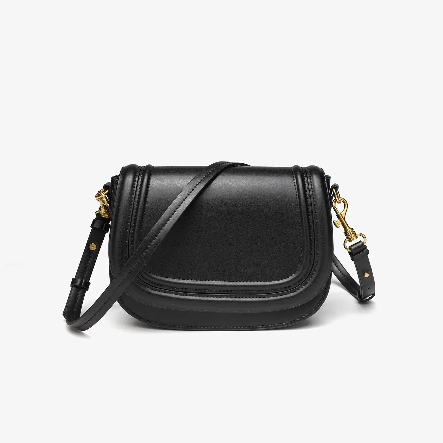 New women's crossbody bag with wide shoulder strap in PU leather, round flap shape, available in black