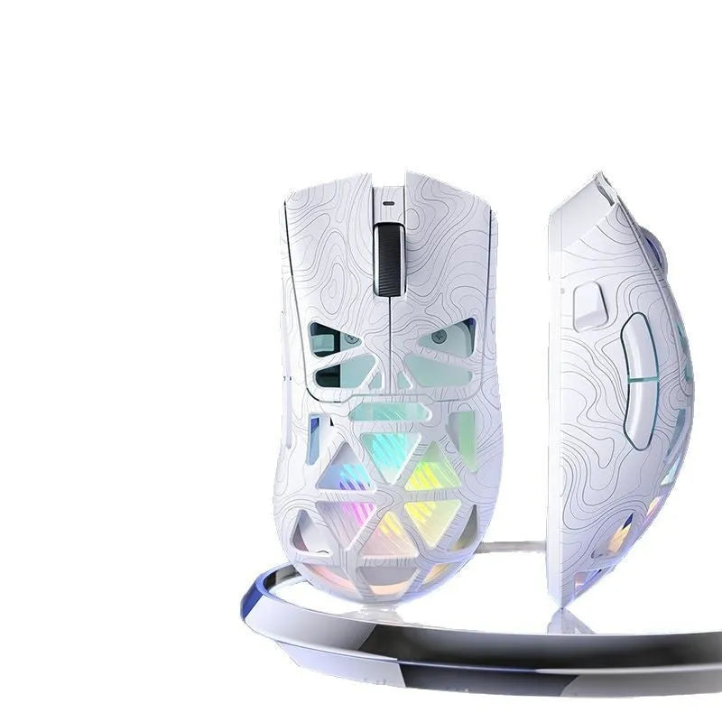 Wireless three-mode hollowed-out mouse in black, white, and pink contour variants for gaming and office use