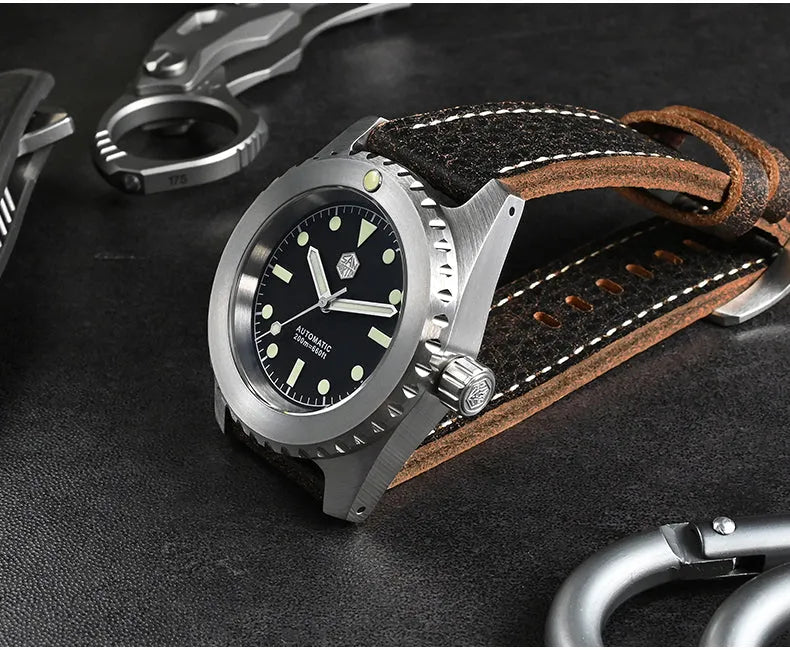 Men's 316L stainless steel diving automatic mechanical watch with black dial, luminous markers, and cowhide strap on white background