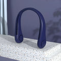 Blue coloured USB rechargeable portable bladeless neck fan being worn.