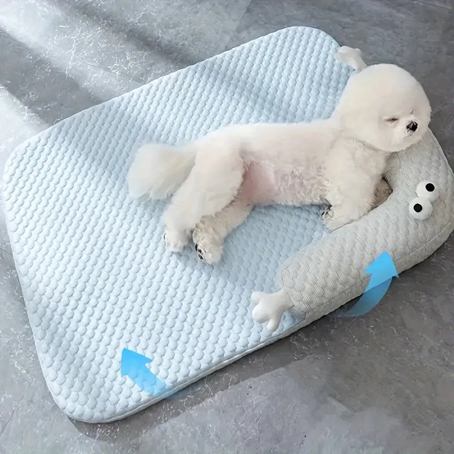 Blue pet bed cushion with big-eyed monster design, non-slip base, for dogs and cats.