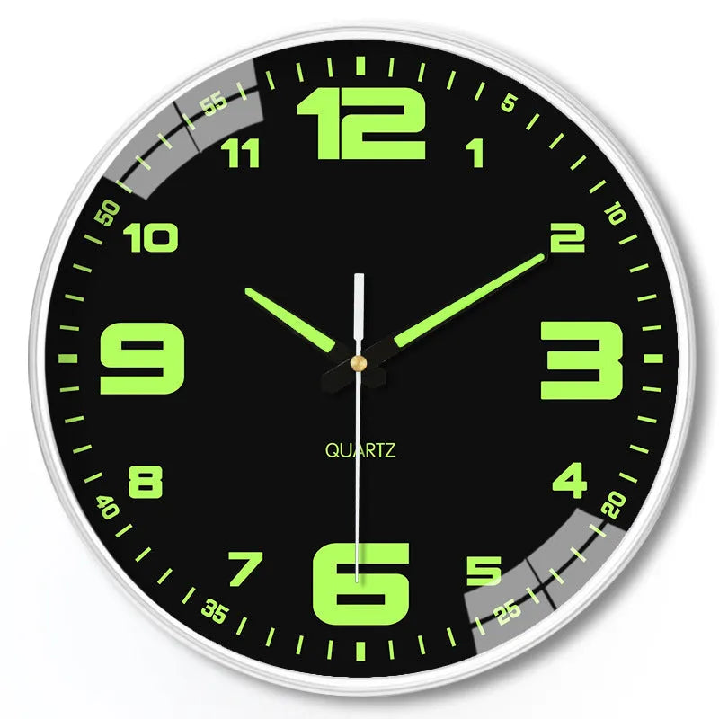 Modern 8-inch luminous wall clock with white face and black numbers on a wall.