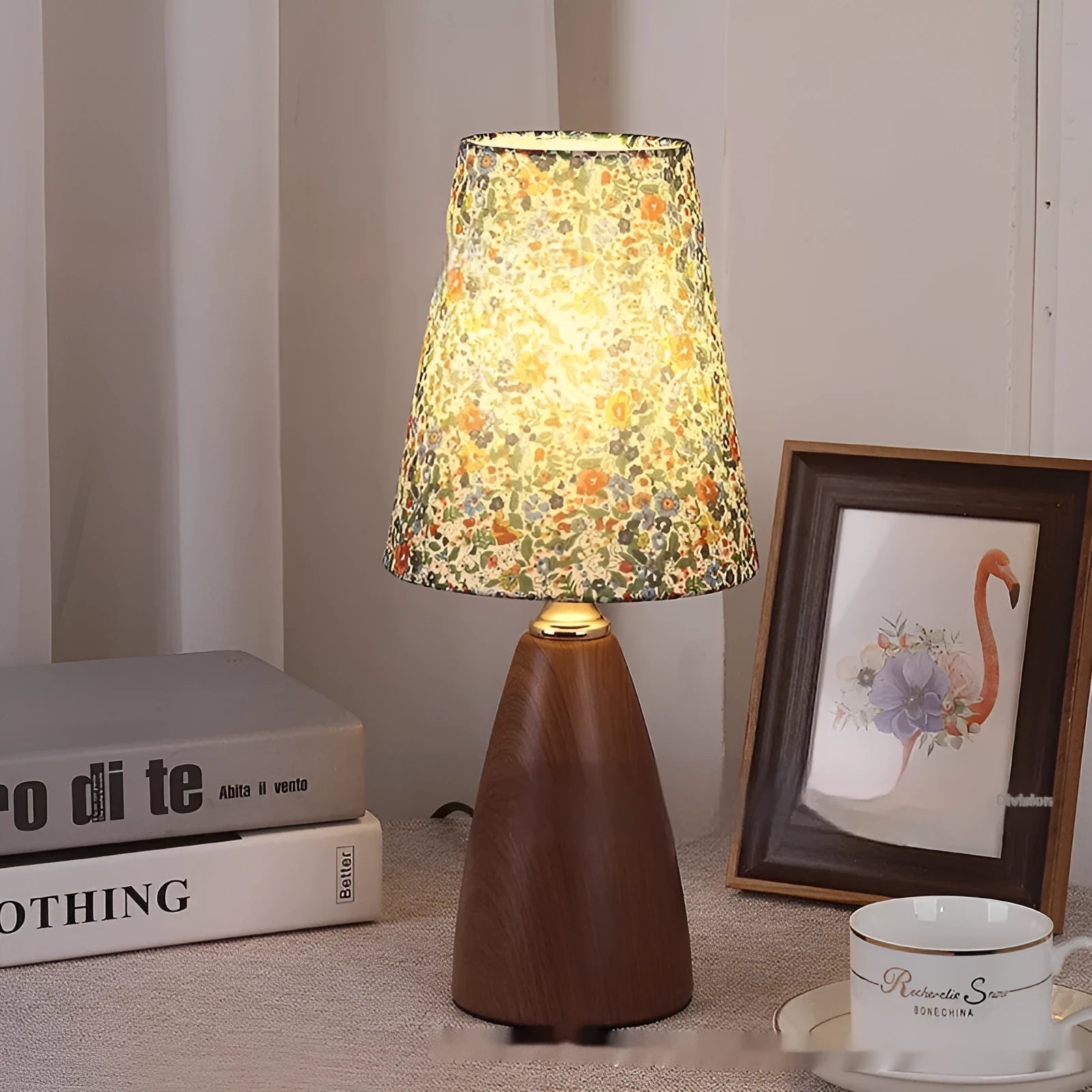 Nordic retro ceramic table lamp with pleated floral shade and remote control on a wooden bedside table.