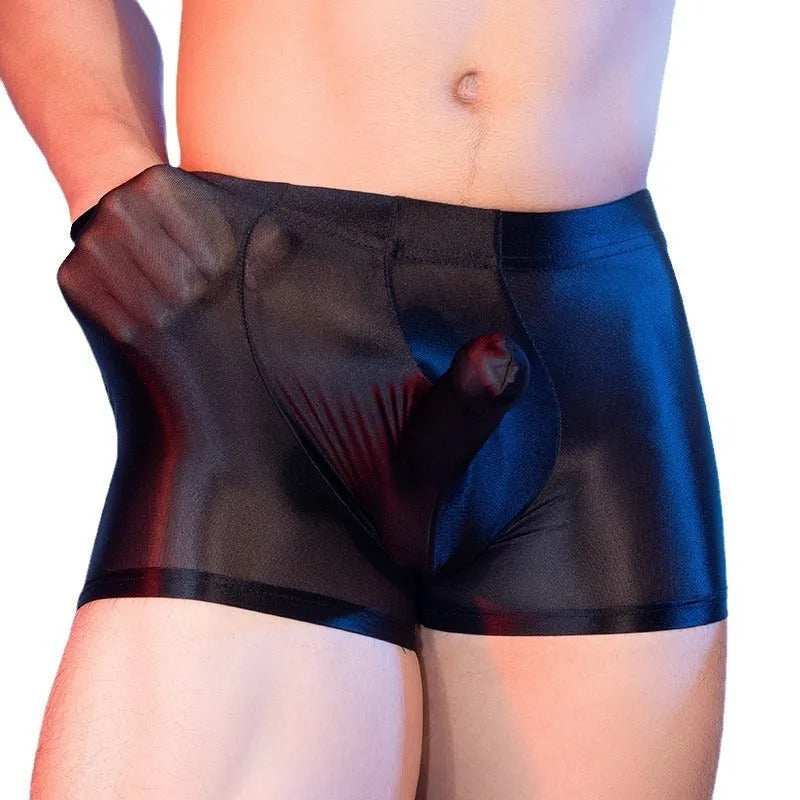 Men's seamless nylon boxer shorts in red, shown flat, featuring a mid-waist and animal print design.