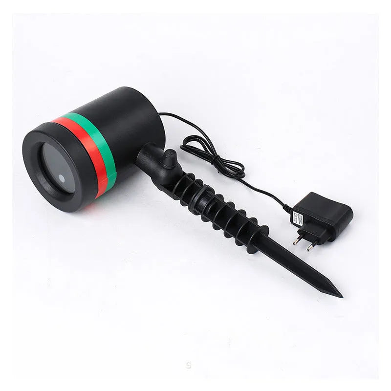 Gypsophila USB laser light Christmas lawn lamp with IP44 waterproof housing, showing red and green laser projection on garden grass at night