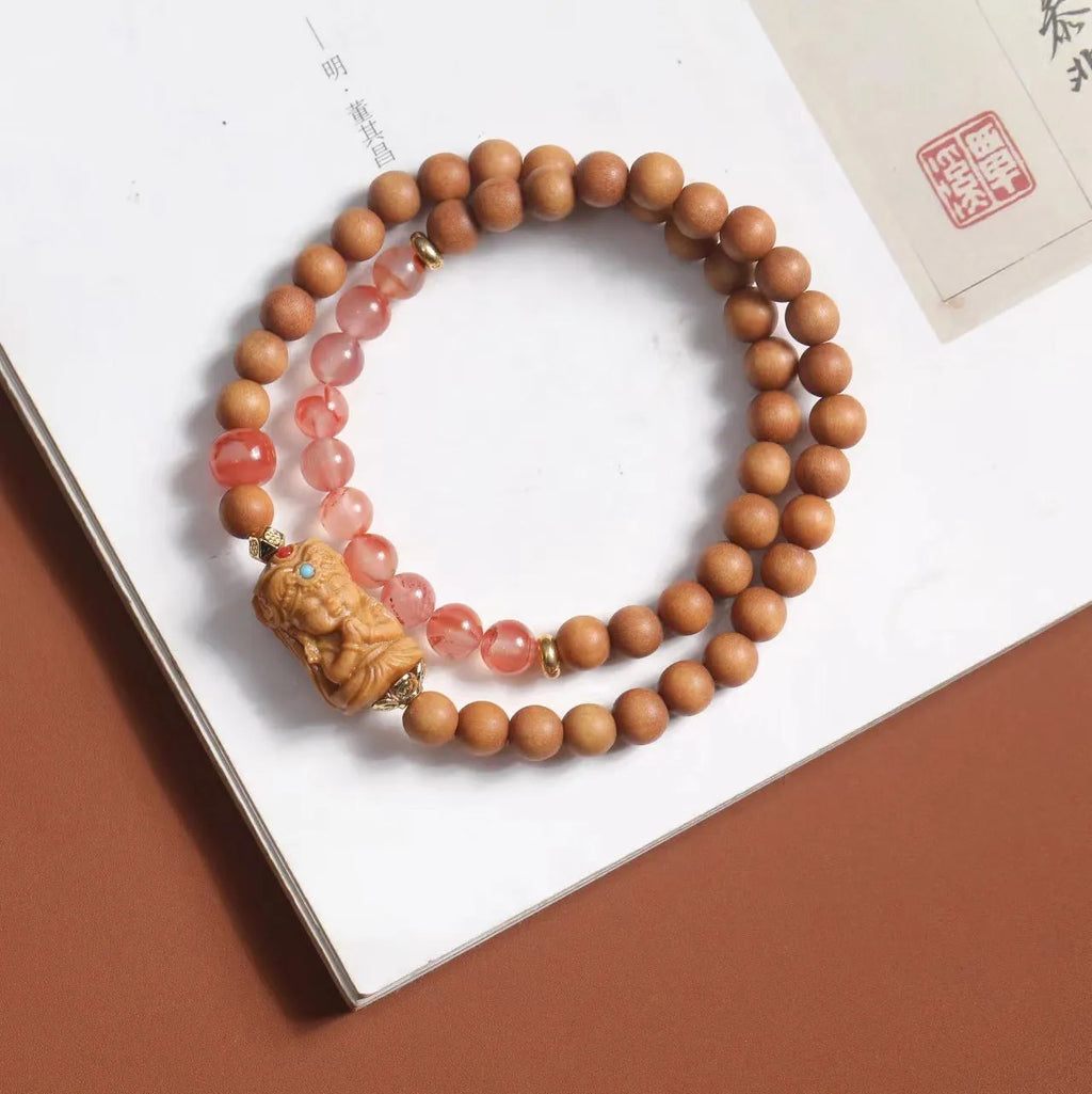Brown wooden double circle bracelet with woven Zachilam pattern and 6mm round beads