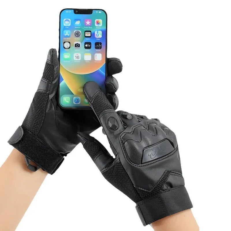 Men's black full finger tactical training gloves with touchscreen fingertips on a hand.