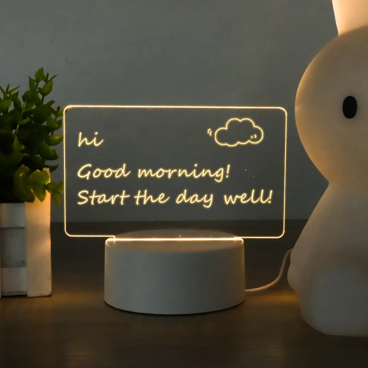 Heart-shaped LED light note board with USB warm yellow illumination on a desk