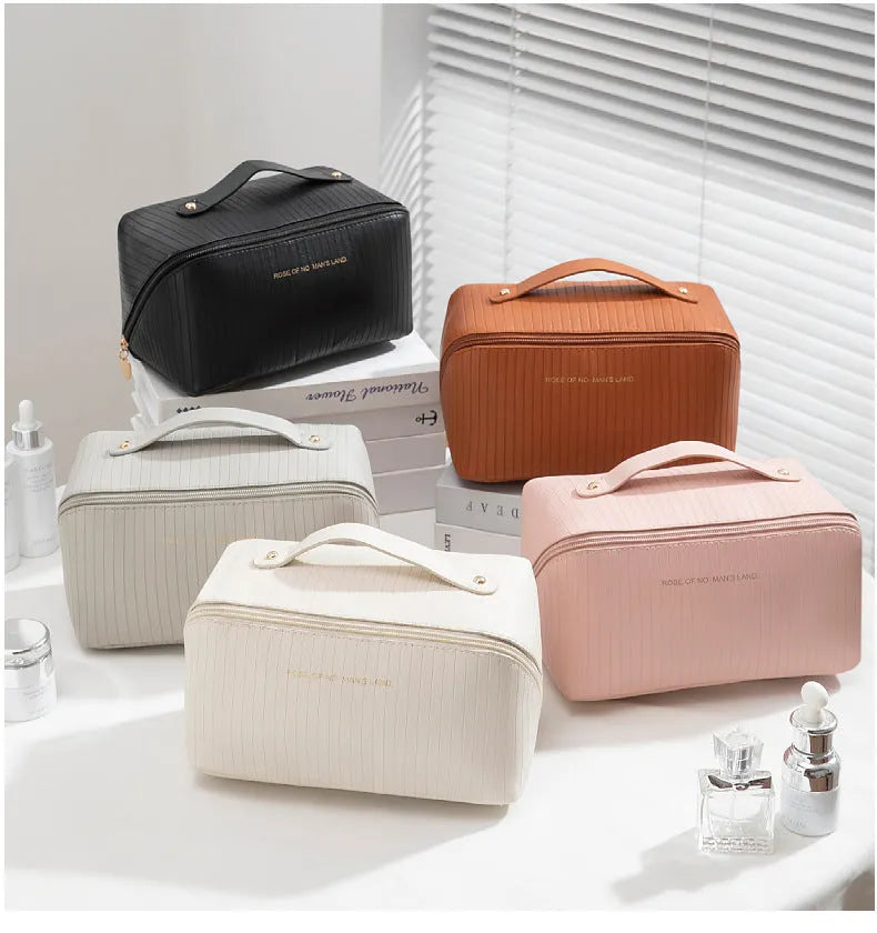 Vertical pattern pillow makeup bag in a cubic shape with large capacity for travel storage.