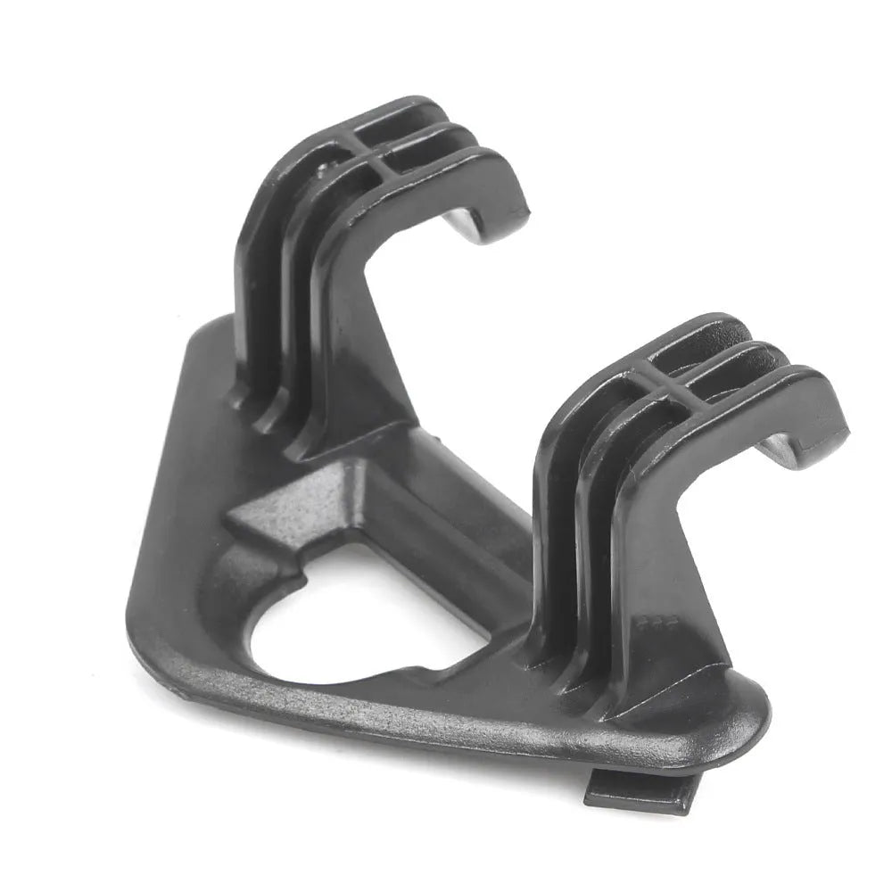 Single black ABS plastic trunk lid hook for Tesla Model Y on dark surface
