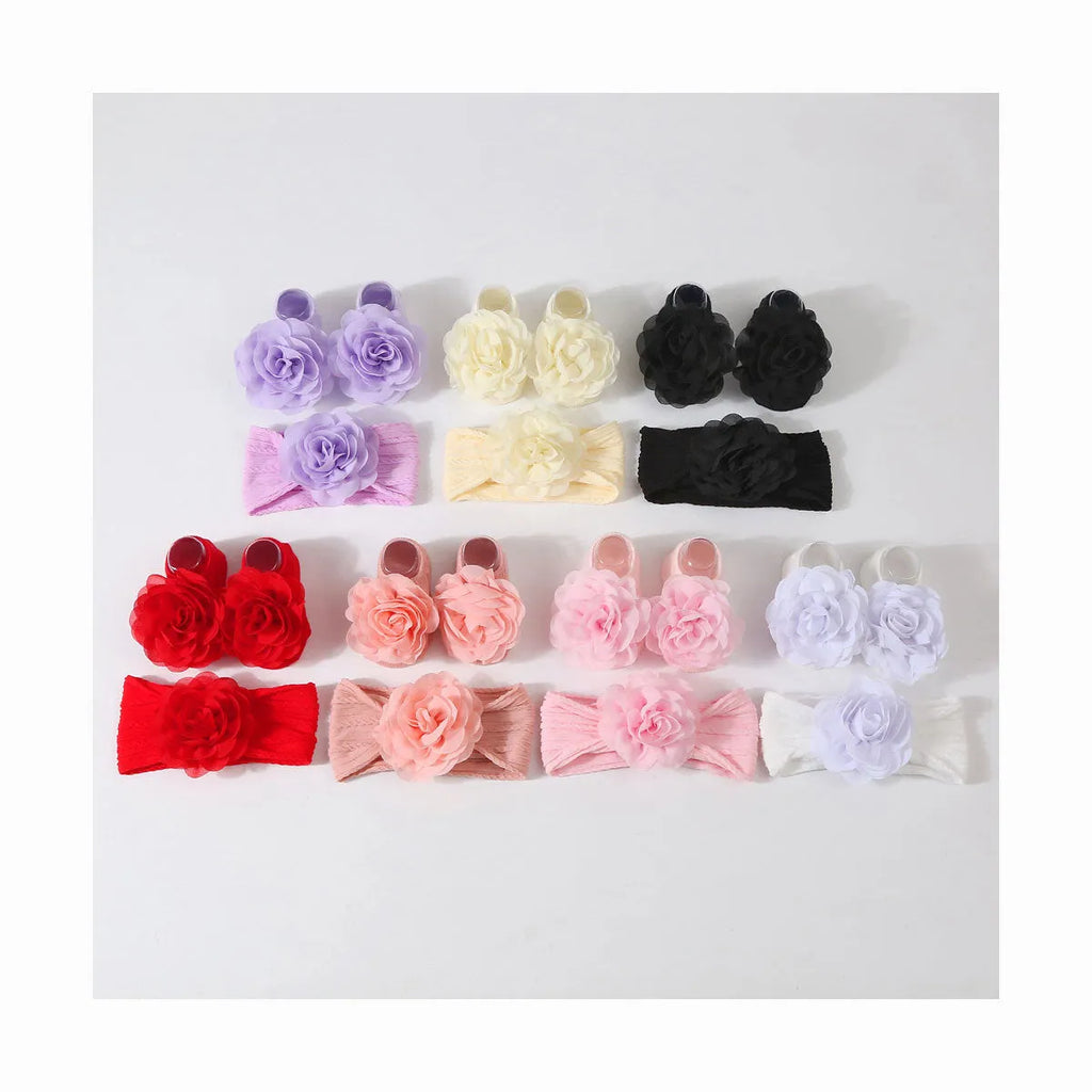 Baby hair band and socks set in nylon with flower-lifting design, available in multiple colours