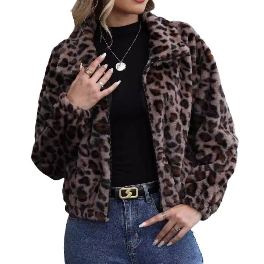 Women's loose fit leopard print plush coat with front zip and raglan sleeves.