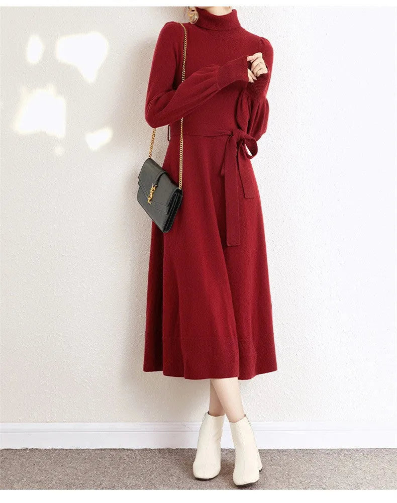 Turtleneck knit dress with elastic waist and long sleeves in solid colour
