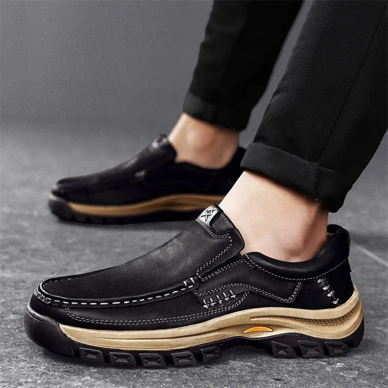 Men's black mountaineering shoes with thick rubber soles and stitched PU leather upper