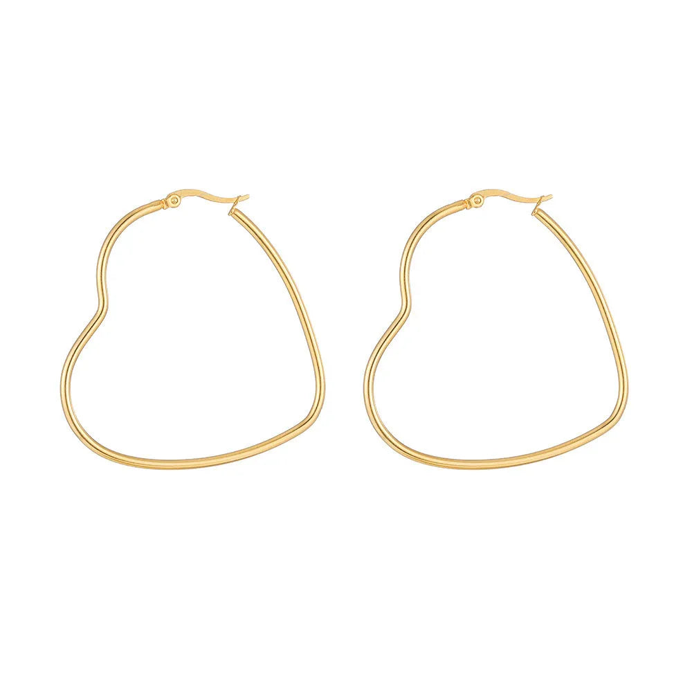 Golden metallic heart-shaped ear clip for women made from twisted electroplated stainless steel