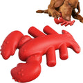 Red Nylabone hard dog chew toy for large aggressive chewers on a white background