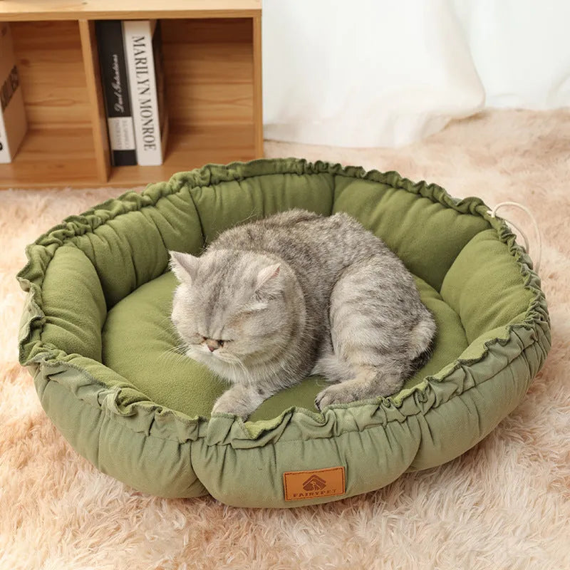 Grey reversible donut pet bed with raised bolster edge for cats or small dogs