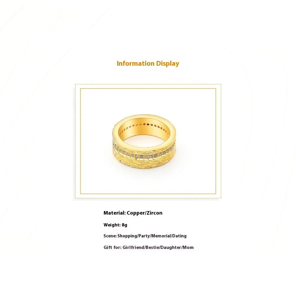 Gold geometric women's ring with zircon stone on copper base, electroplated finish.