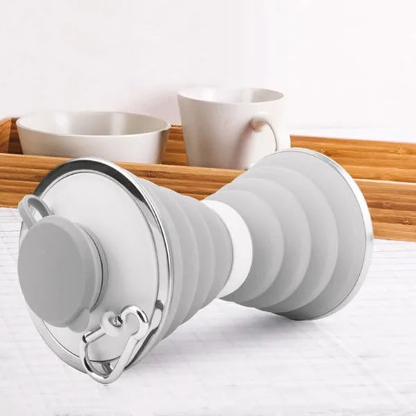 500ml silicone collapsible water bottle cup shown both expanded and folded with stainless steel rim