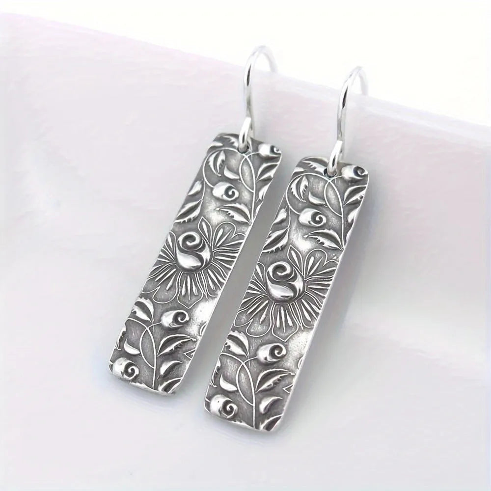 Long silver geometric earrings with carved vine design and retro European American style