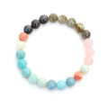 Bohemian 108 colour stone necklace with tassel pendant and matching bracelet on display
