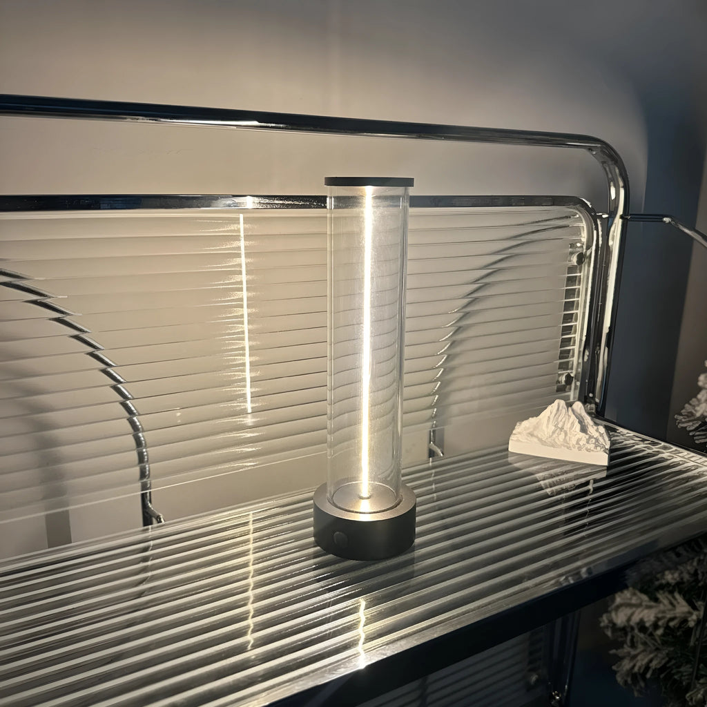 Tall, narrow modern USB LED night light strip with glass panel and magnetic base.