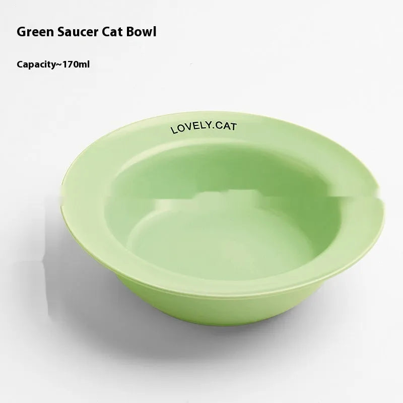 Ceramic UFO cat bowl in beige resting on square white rack, raising food height for whisker comfort