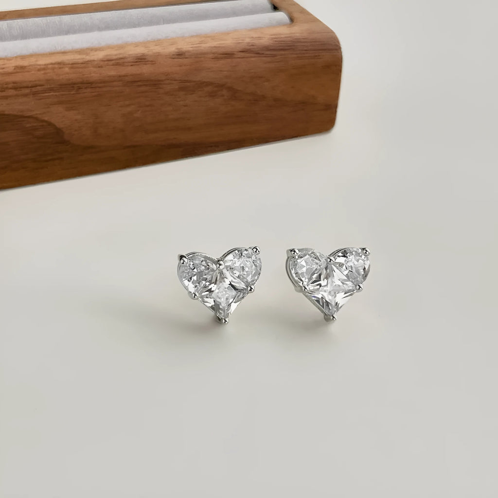 925 silver heart-shaped stud earrings with zircon in platinum pink diamond finish