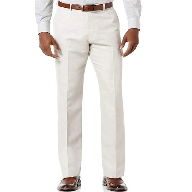 Men's beige linen trousers with slant pockets laid flat on a surface.