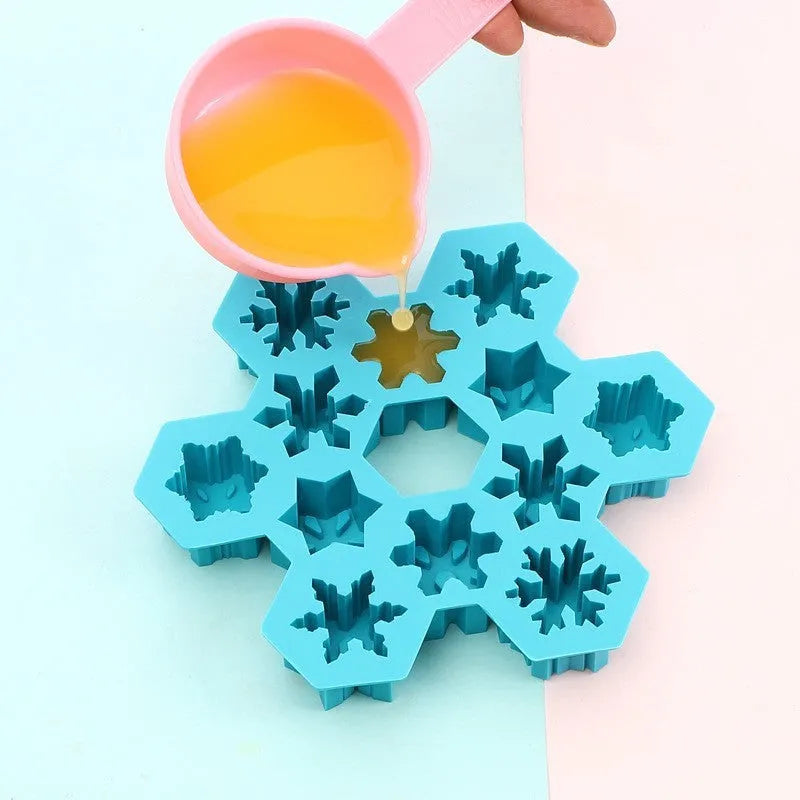 12-hole snowflake silicone mold in light blue for DIY ice cubes and baking