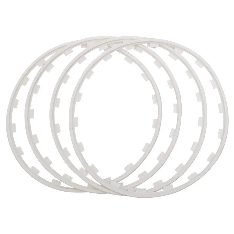 Set of four coloured nylon wheel hub guard rings for alloy wheel protection.