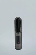 Portable charging negative ion hair comb in blue, grey, or white, showing teeth and sleek ABS plastic body.