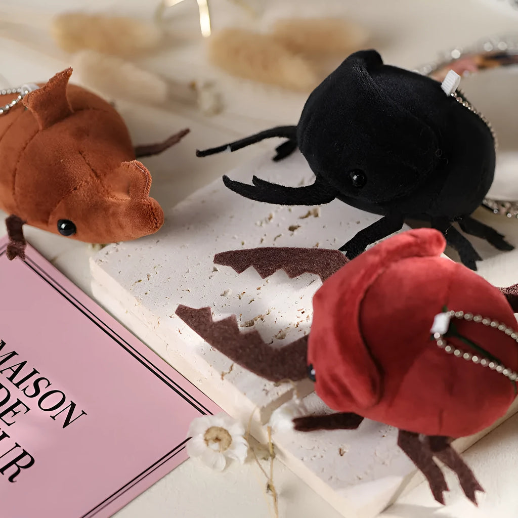 Japanese rhinoceros beetle plush doll pendant in six colour variations showing 10cm height