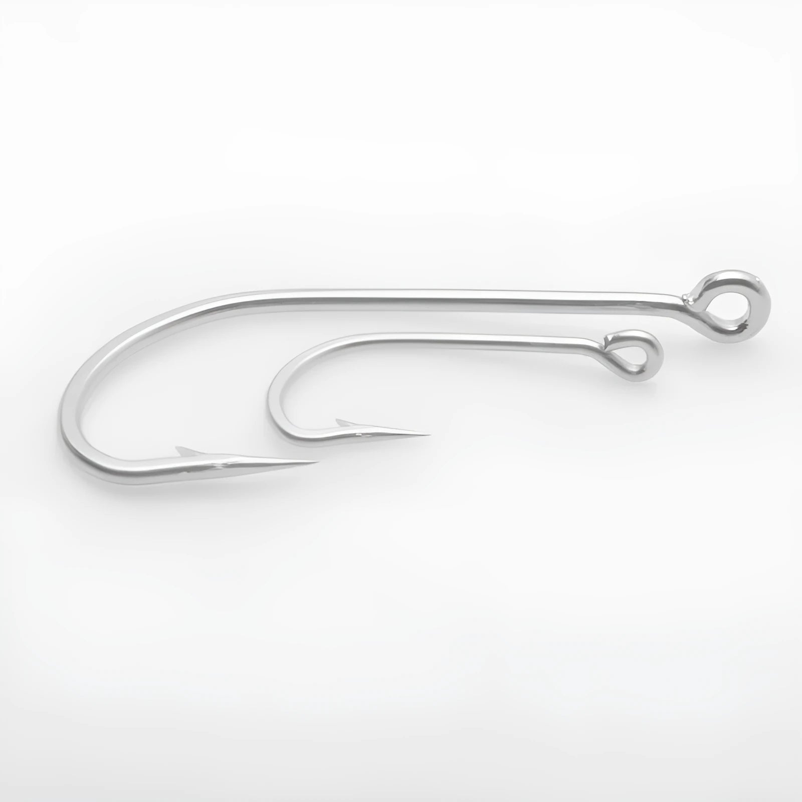Assortment of alloy sea fishing hooks on a blue background for ocean boat fishing.