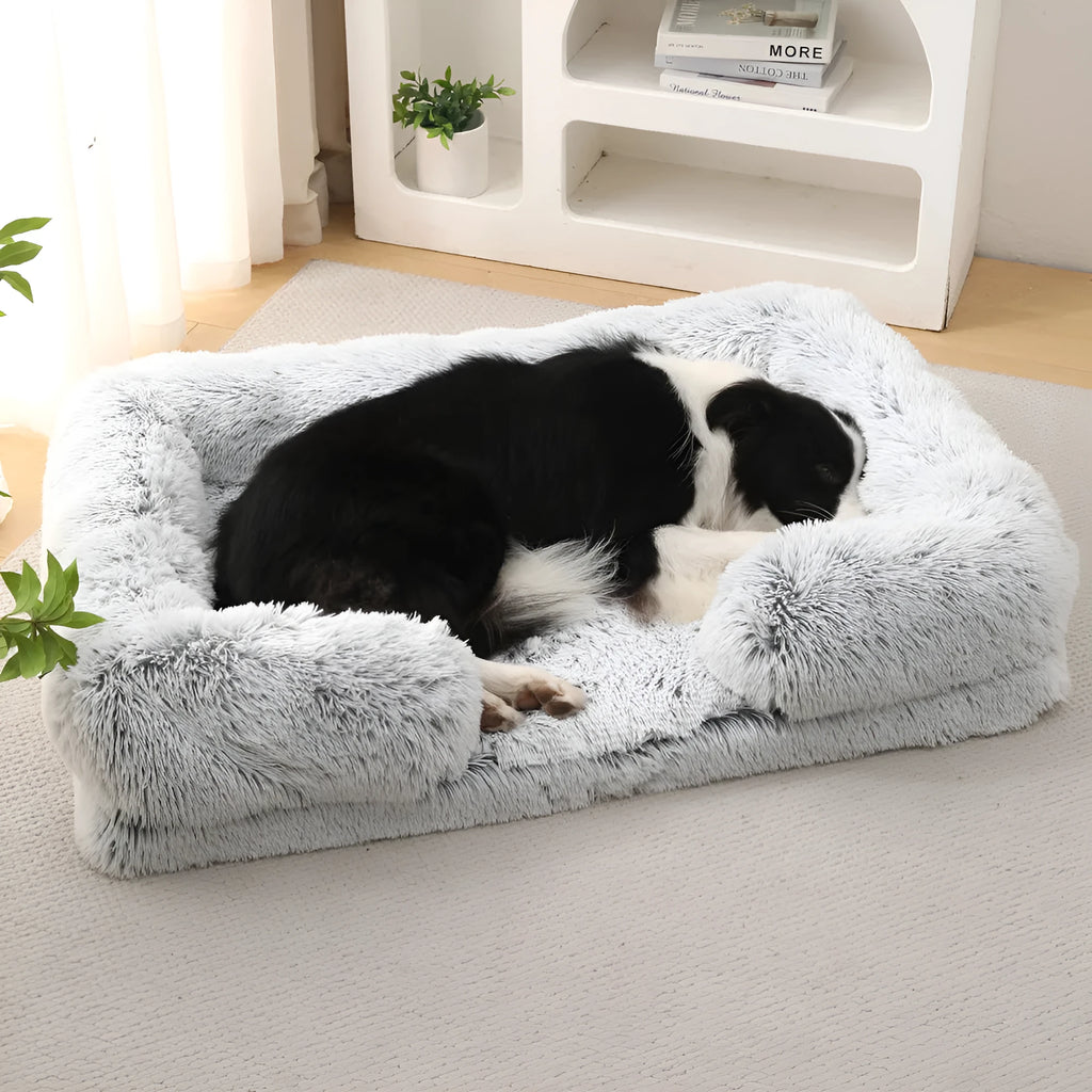 Round plush dog bed with raised rim and removable inner sleeve in beige brown colour