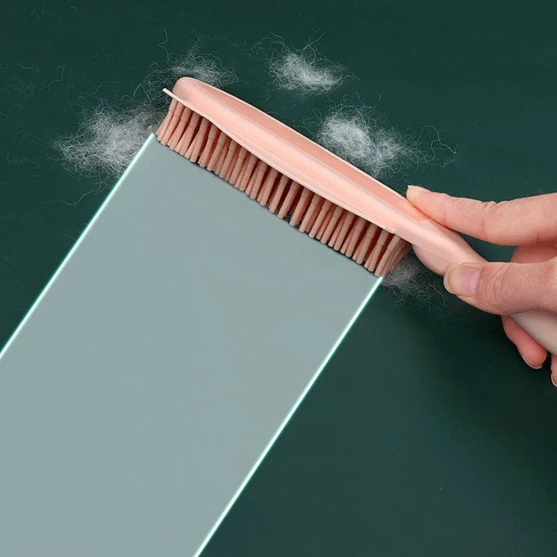 Self-cleaning dog brush pet hair remover in green with integrated hair collector, on white background