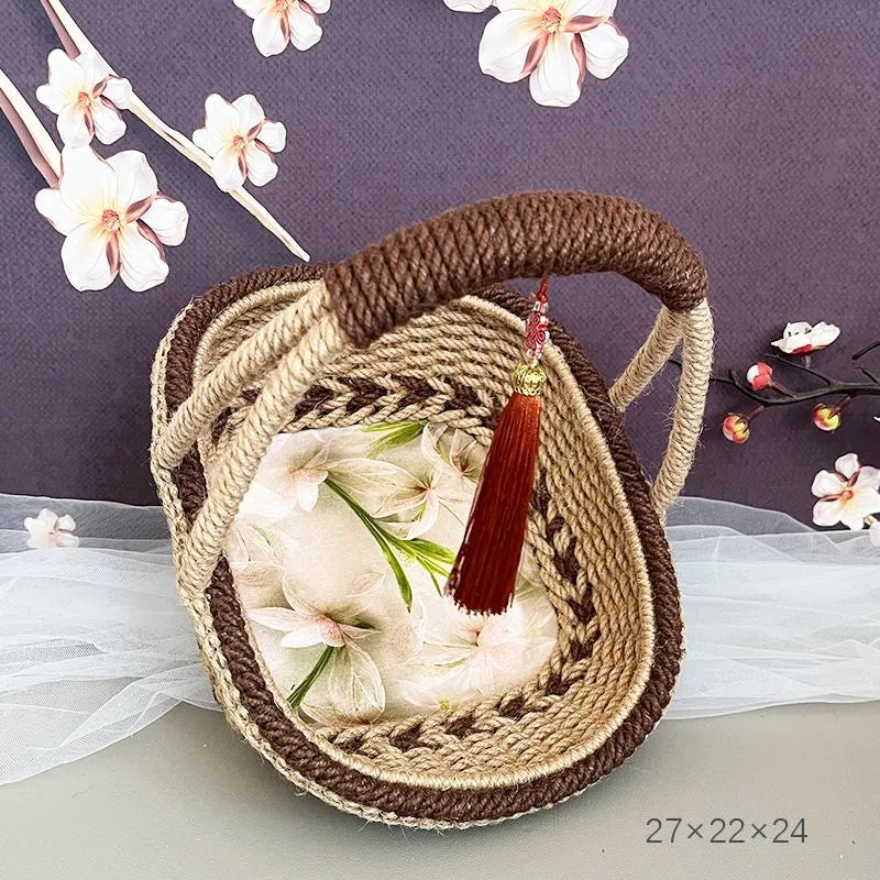 Coffee brown hand-woven straw basket with rustic texture, shown from a side angle.