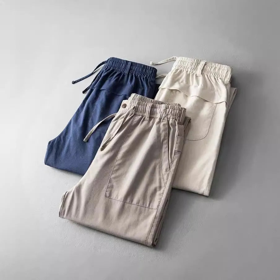 Men's linen casual trousers in solid colours with mid waist design for leisure wear