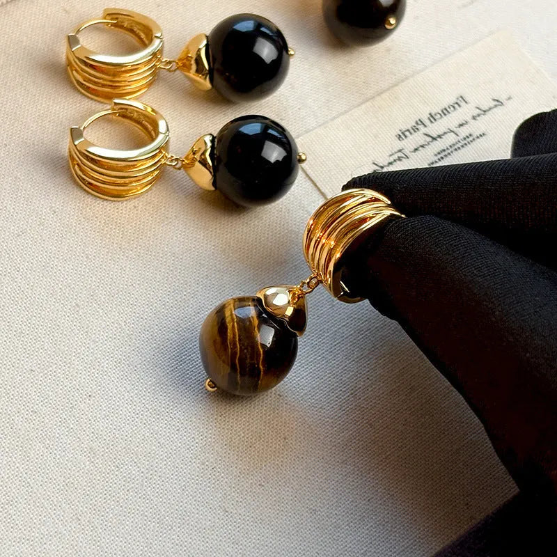 Gold-plated tigereye stone earrings with geometric round shape in French retro style