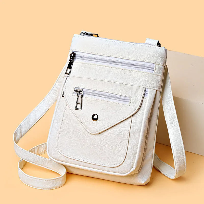 Vertical square crossbody mobile phone bag in PU leather with decorative sewing lines