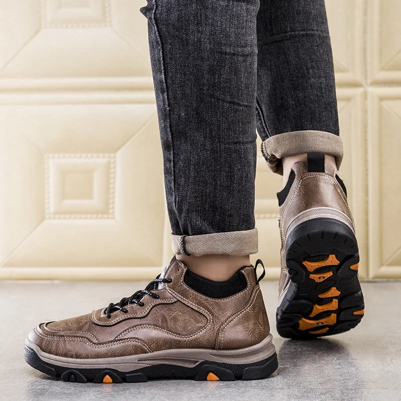 Men's winter warm ankle work boots in black cotton version, side view showing thick sole and front tie lacing