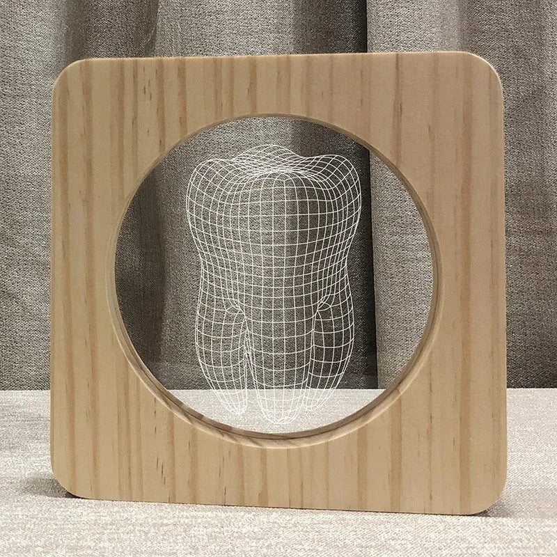 Tooth shaped night lamp with wood acrylic finish, shown with USB cable.