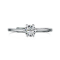 Sterling silver adjustable ring with round zircon in six-claw setting, open mouth band, geometric design